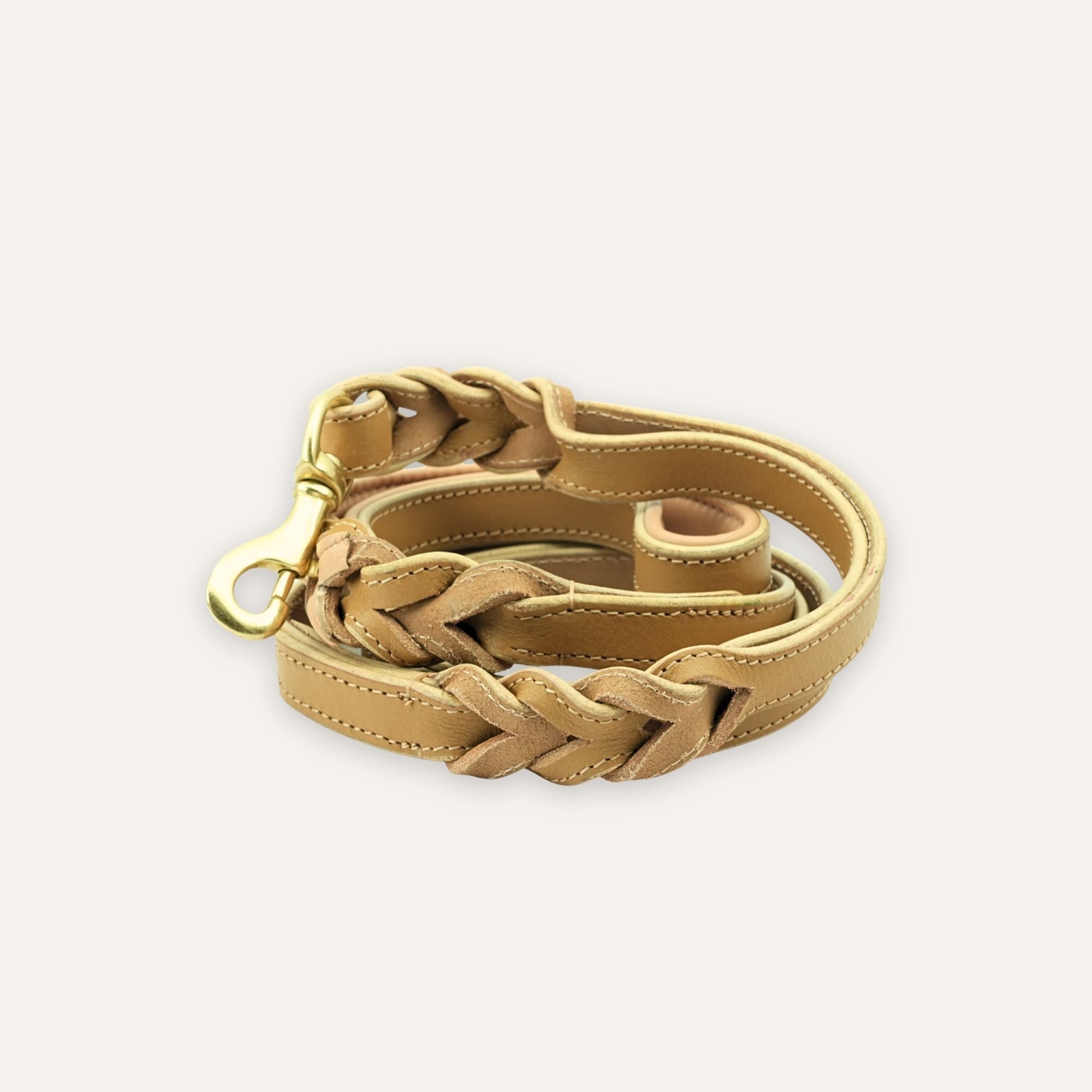 Soft beige braided leather dog leash with brass clasp